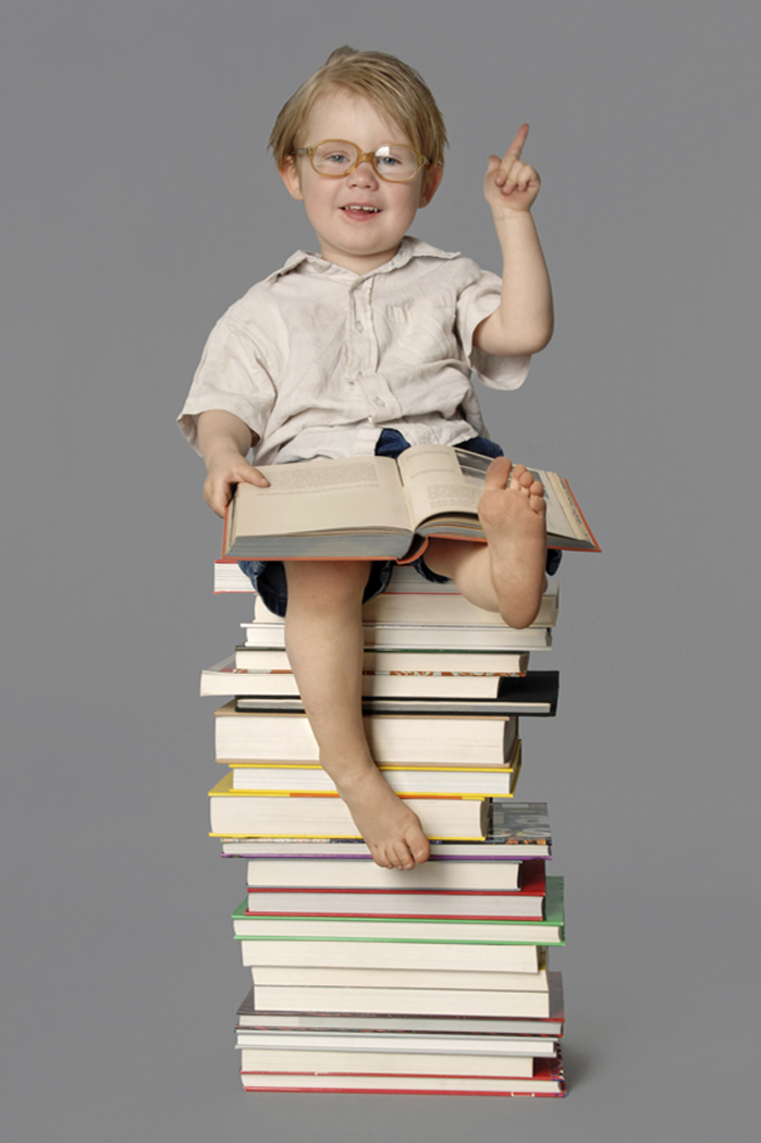 Boy on books.jpg